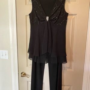 Two piece Black Special Occasion outfit, with sparkle and sequin-like detail.